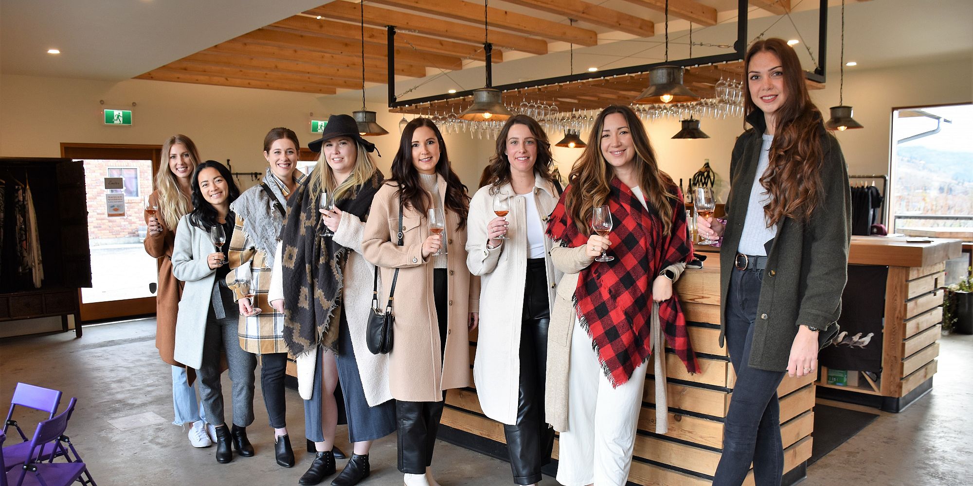 Eight Ladies Enjoying A Private Wine Tasting Inside The Three Sisters Winery