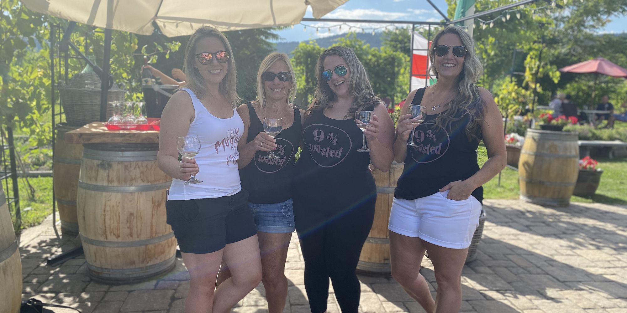 Four Ladies In Themed Bachelorette Shirts Wine Tasting On Ciao Bella Estate Winery’s Patio