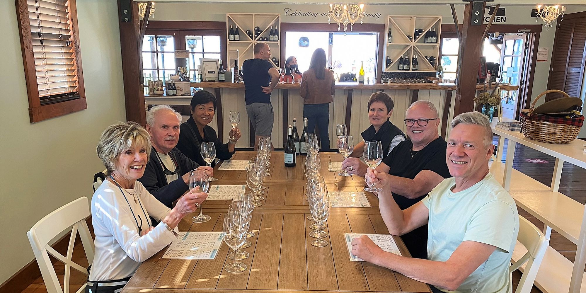 Three Couples Enjoying A Seated Wine Tasting At Da Silva Vineyards