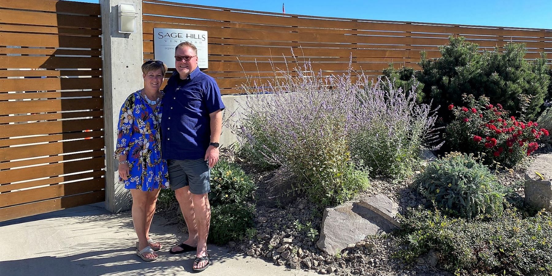 Couple Standing Outside The Sage Hills Estate Winery Entrance 