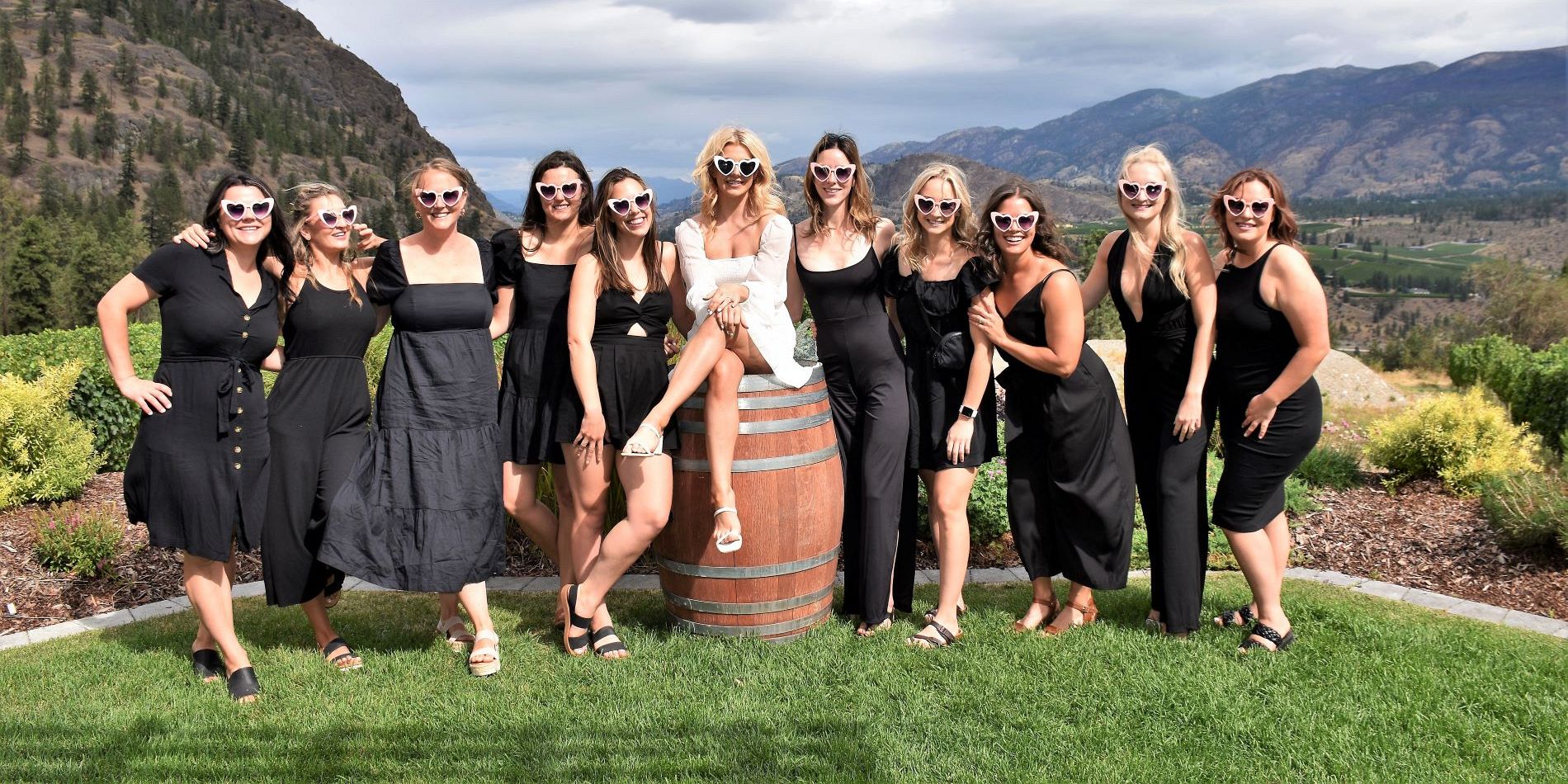 Bridal Party Of Ten With Bride To Be Sitting On An Oak Wine Barrel Overlooking See Ya Later Ranch Vineyard